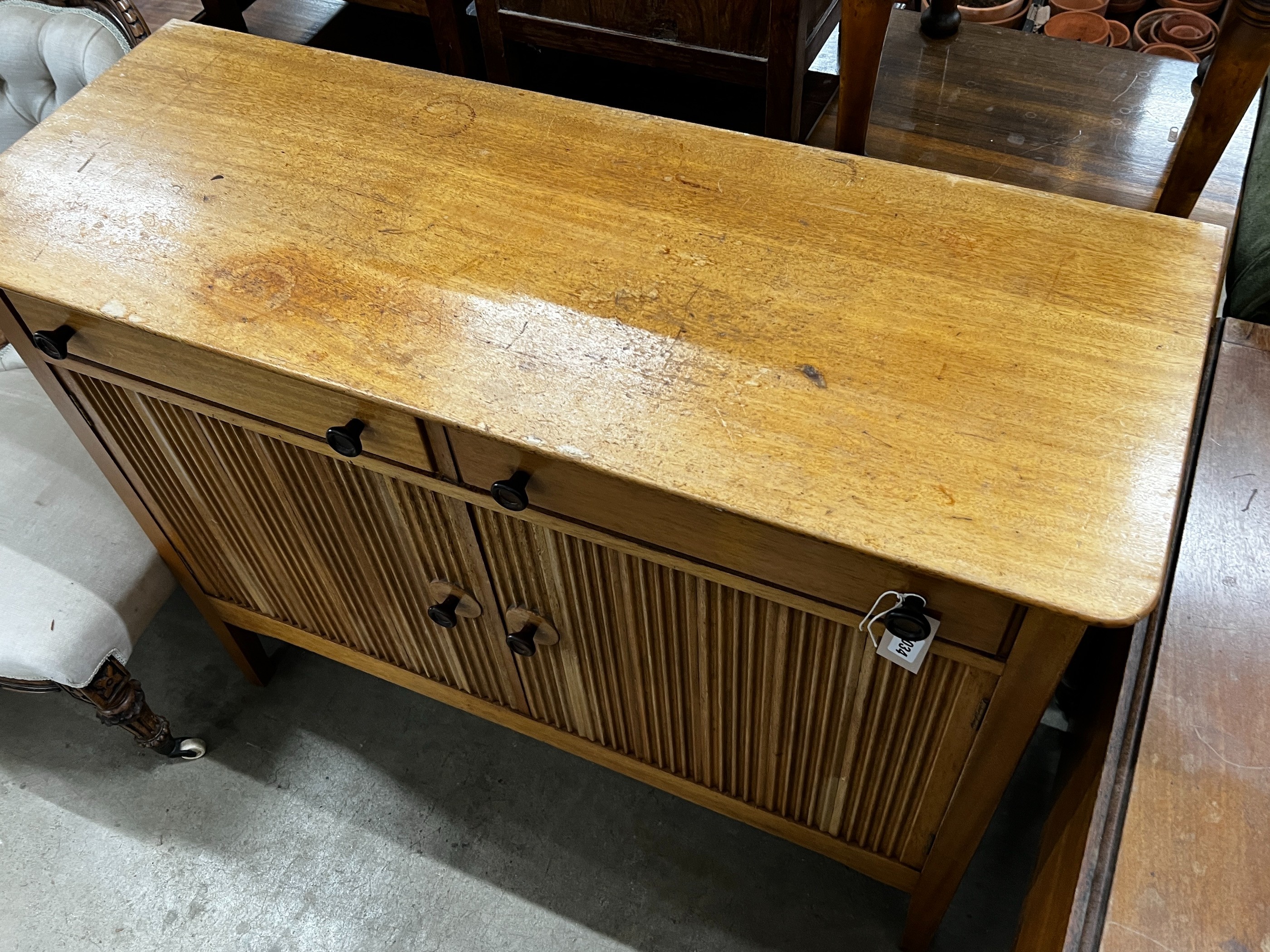 A mid century teak small sideboard, width 114cm, depth 43cm, height 89cm